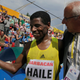 Jos Hermens and the most famous runner he represents, Haile Gebrselassie. Photo credit: Peter Dejong/AP